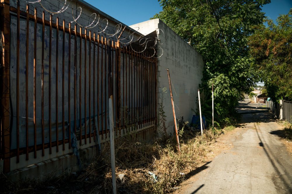 Back Alley Way w Fence Standing Set for Filming on Location Los Angeles