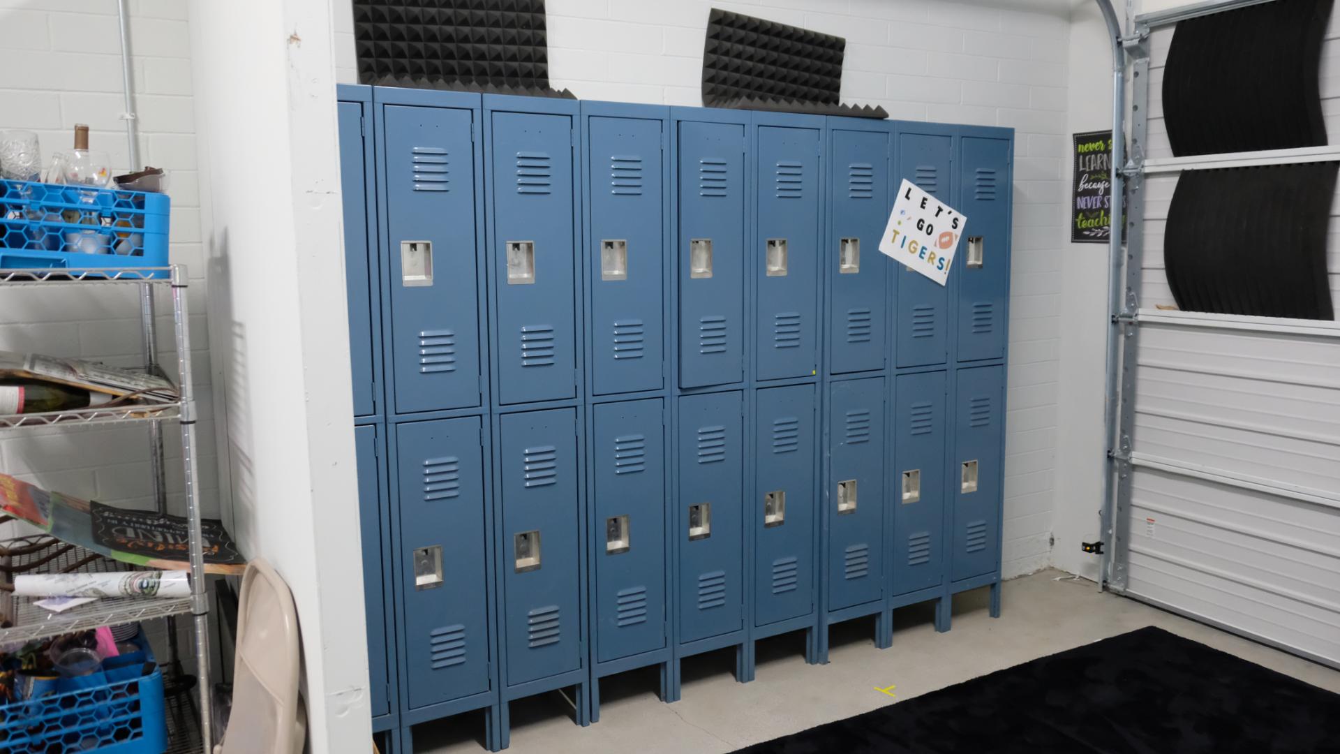School hallway with lockers designed to feel authentic and lived-in for a narrative scene